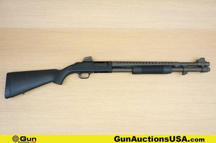 Mossberg 590 12 ga. Shotgun. Good condition, Normal Handling Marks, Scattered Spotting and/or