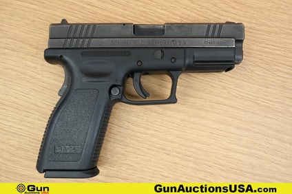 SPRINGFIELD XD-40 40 S&W Pistol. Good condition, Normal Handling Marks, Scattered Spotting and/or
