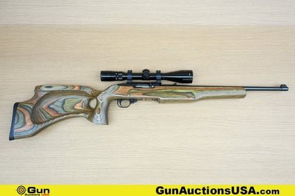 RUGER 10/22 .22 LR Rifle. Good condition, Normal Handling Marks, Scattered Spotting and/or Pitting.