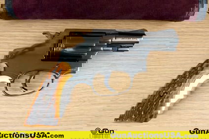 S&W 36 .38 S&W SPL Revolver. Good condition, Normal Handling Marks, Scattered Spotting and/or