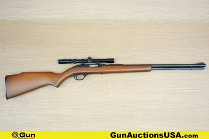 MARLIN 60 .22 LR Rifle. Good condition, Normal Handling Marks, Scattered Spotting and/or Pitting.