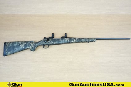 Winchester 70 .300 WSM Rifle. Very Good. 24" Barrel. Shiny Bore, Tight Action Bolt Action Features a