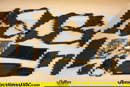 Uncle Mike's, Etc. Holsters. Very Good. Approx. 11 Assorted Nylon Holsters. . (79807) (GSCO85)