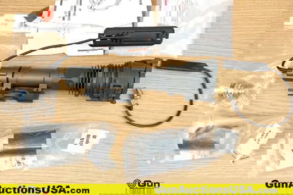 Surefire M952 Accessory. Good Condition. One 1913 Rail Mounted Flashlight, Features Anodized