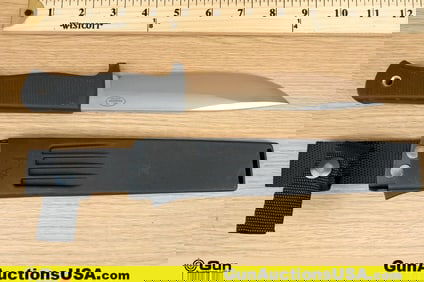 Fallknieven A1 Knife. Very Good. One Bowie Style Knife. Features Brushed 6" VG10 Steel Drop Point