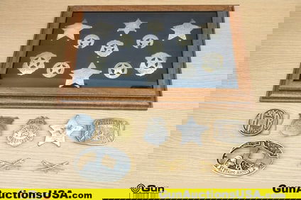 0 Antiques. Good Condition. Nineteen Assorted Antique Badges, Pins, and Belt Buckles In Display