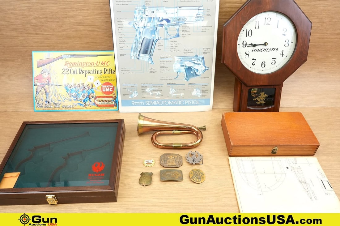 Ruger, Winchester, Rem, Etc Displays. One 50th Anniversary Ruger Presentation Case, One Winchester: Ruger, Winchester, Rem, Etc Displays. One 50th Anniversary Ruger Presentation Case, One Winchester Clock, One Wooden Fitted Revolver Box, One Bugle, One Remington Wall Art, Two Blueprint Style Wall Ar