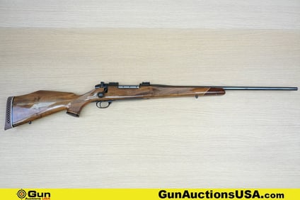 WEATHERBY MARK V 7MM W.M. Rifle. Very Good. 24" Barrel. Shiny Bore, Tight Action Bolt Action