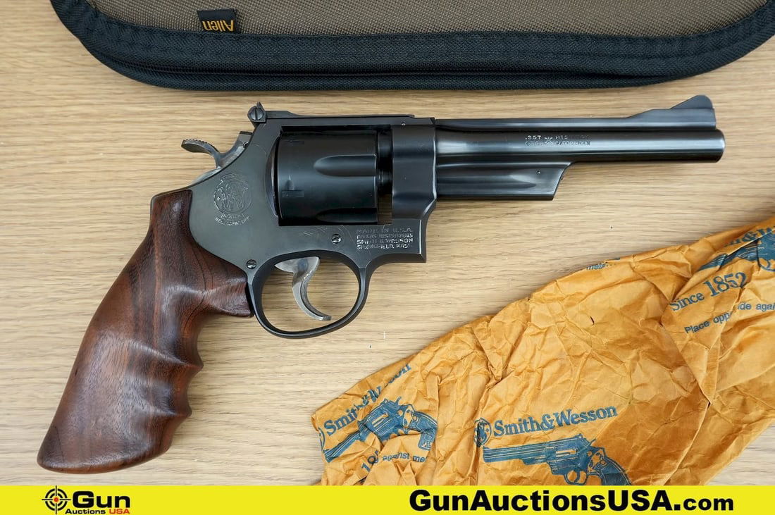 S&W 28-2 HIGHWAY PATROLMAN .357 Magnum Revolver. Very Good. 5.75" Barrel. Shiny Bore, Tight Action: S&W 28-2 HIGHWAY PATROLMAN .357 Magnum Revolver. Very Good. 5.75" Barrel. Shiny Bore, Tight Action Features a New Six Shot Fluted Cylinder Replaced by S&W, Fixed Serrated Front Sight, Adjustable Rear