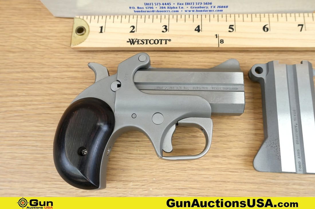 Bond Arms 45 COLT/410GA Pistol. Very Good. 3" Barrel. Shiny Bore, Tight Action Two Shot Derringer A: Bond Arms 45 COLT/410GA Pistol. Very Good. 3" Barrel. Shiny Bore, Tight Action Two Shot Derringer A compact powerhouse blending .45 Colt punch with .410 gauge versatility, with Stainless Construction,