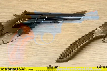 S&W 34-1 .22 LR Revolver. Very Good. 4" Barrel. Shiny Bore, Tight Action Features a Fixed Serrated