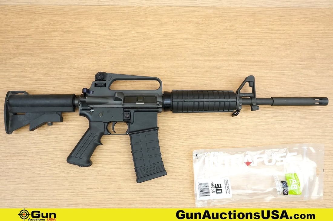 PWA COMMANDO 5.56 MM Rifle. Good condition, Normal Handling Marks. 16" Barrel. Shiny Bore, Tight: PWA COMMANDO 5.56 MM Rifle. Good condition, Normal Handling Marks. 16" Barrel. Shiny Bore, Tight Action Semi Auto Features a Parkerized Barrel with Faux XM177 Booster Pinned and Welded. A Frame Front