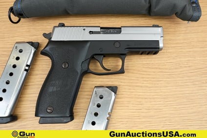 SIG SAUER P220 .45 AUTO Pistol. Good condition, Normal Handling Marks. 3.75" Barrel. Shiny Bore,