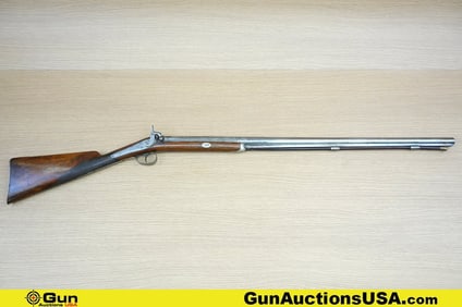 HONDON BACK ACTION 12 Ga. Shotgun. Good condition, Normal Handling Marks. 33" Barrel. Percussion