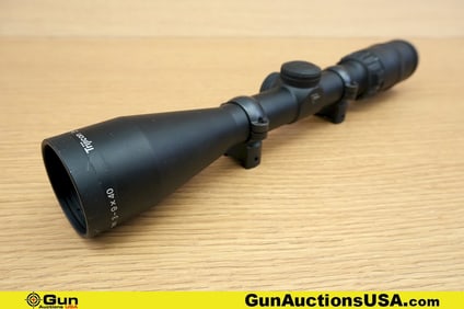 Trijicon Scope . Very Good. 3-9x40 Scope, Illuminated Triangle Post Reticle, 1" Tube. . (80032)