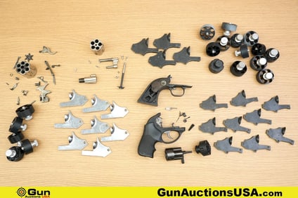 S&W, Ruger, Etc. Gun Parts, Accessories . Very Good. Approx. 57 Gun Parts and Accessories; 13 RG