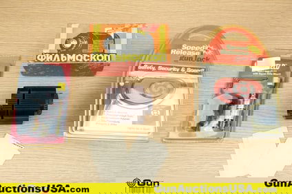 Fire Field, Etc. Accessories. Very Good. One Speed Release Gun Lock, One Fire Field Red Laser Sight