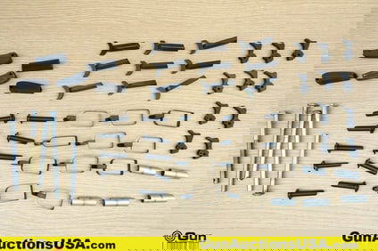 Assorted Safeties, Etc. . Very Good. Assorted 1911 Thumb Safeties, Guide Rods, and Grip Safeties. .