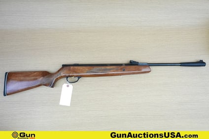 HATSAN 95 .177 AIR RIFLE. Very Good. 17 5/8" Barrel. Break Action Features a Fixed Fiberoptic Front