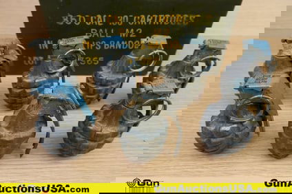 U.S. Surplus Inert Grenades. Good Condition. Seven Practice Inert Grenades. Includes Metal Ammo Can.