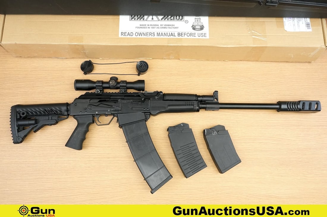 Izhmash SAIGA-12 12 ga. 12 Ga. AK Shotgun. Excellent. 18.5" Barrel. Shiny Bore, Tight Action Semi: Izhmash SAIGA-12 12 ga. 12 Ga. AK Shotgun. Excellent. 18.5" Barrel. Shiny Bore, Tight Action Semi Auto WOW! Featuring a THREADED BARREL with a CSS Muzzle Break, Hinged Top Cover, with Accessory Rail.