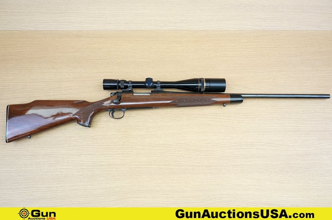 REMINGTON 700 .223 REM Rifle. Very Good. 24" Barrel. Shiny Bore, Tight Action Bolt Action Features a: REMINGTON 700 .223 REM Rifle. Very Good. 24" Barrel. Shiny Bore, Tight Action Bolt Action Features a Brushed Blued Barrel and Action, JEWELED BOLT, Barrel is Drilled and Tapped for Front and Rear Sigh
