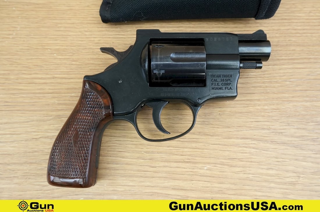 DE ARMAS FIE TITAN TIGER .38 SPL Revolver. Very Good. 2" Barrel. Shiny Bore, Tight Action Features a: DE ARMAS FIE TITAN TIGER .38 SPL Revolver. Very Good. 2" Barrel. Shiny Bore, Tight Action Features a Fixed Removable Front Sight, Trench Style Rear Sight, DA/SA Hammer and Trigger, with a Six Shot Flu