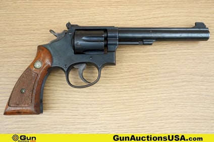 S&W K-38 .38 S&W SPECIAL CTG Revolver. Good Condition, Normal Handling Marks. 6" Barrel. Shiny Bore,