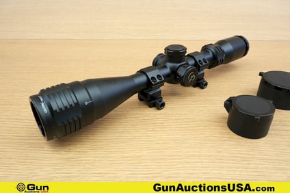 Center Point Scope . Very Good. 4-16x40 Scope, illuminated Duplex Reticle, Capped MOA Turrets, 1"
