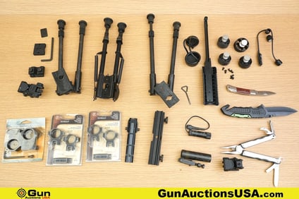 Thompson Center, Falcon, Leatherman, Etc. . Very Good. Bi-Pods, Charging Handle, Etc. Three Bi-Pods.