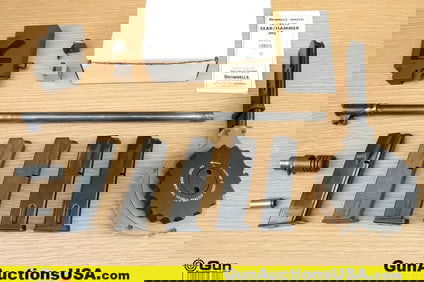 Brownell's, Beretta, Etc. . Very Good. Jig, Barrel, Etc. One 1911 Sear Jig with Box. Four Beretta 92