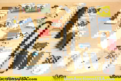 Beretta, S&W, Ruger, Etc. . Very Good. Gun Parts and Accessories Seven Scope Ring Sets. Assorted