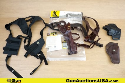 Triple K, Etc. . Very Good. Holsters One Torso Rig leather Holster, One Nylon Shoulder Holster, and