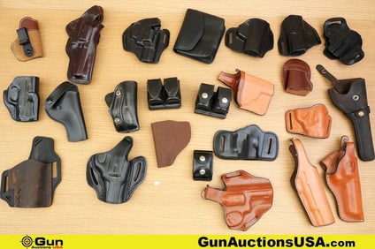 DeSantis, Hunter, Etc. . Good Condition. Holsters, Pouches Approx. 20 leather Holsters and Four