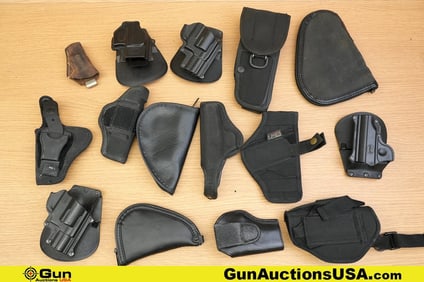 Fobus, Etc. Holsters, Pouches . Very Good. Six Nylon Holsters, Three Padded Pistol Pouches, Two