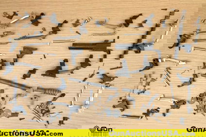 Glock, S&W Gun Parts. Very Good. Assorted Gun Parts for 17, 19, 22, 23 and 27. . (80929) (GSCN12)