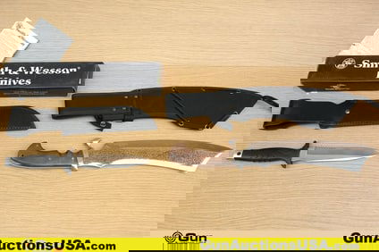 S&W, Hibben Knives. Excellent. One S&W 960 Fixed Blade Knife with Sheath, Box and papers. One Hibben