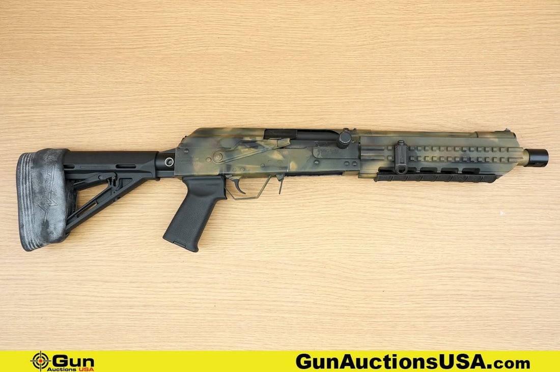 IZHMASH SAIGA-12 12 ga. SBS NFA/Short Barrel Shotgun. Good Condition, Normal Handling Marks. 10 3/4": IZHMASH SAIGA-12 12 ga. SBS NFA/Short Barrel Shotgun. Good Condition, Normal Handling Marks. 10 3/4" Barrel. Shiny Bore, Tight Action Semi Auto NFA ITEM, Features a THREADED BARREL with Thread Protect