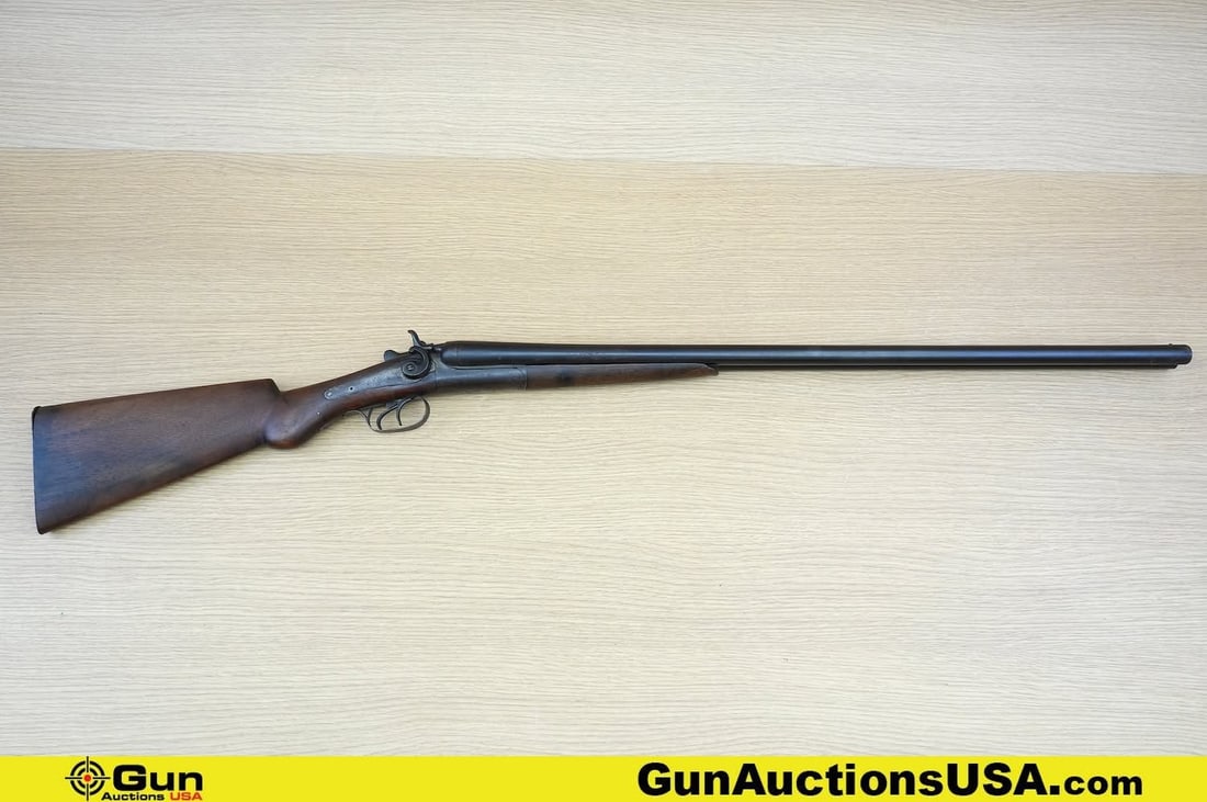 JANSSEN 12 ga. Shotgun. Good Condition, Normal Handling Marks. 30" Barrel. Dark Bore Break Action: JANSSEN 12 ga. Shotgun. Good Condition, Normal Handling Marks. 30" Barrel. Dark Bore Break Action SXS Features Blued Steel Construction with Even Patina, Brass Bead Front Sight, Wood Hand Guard and St