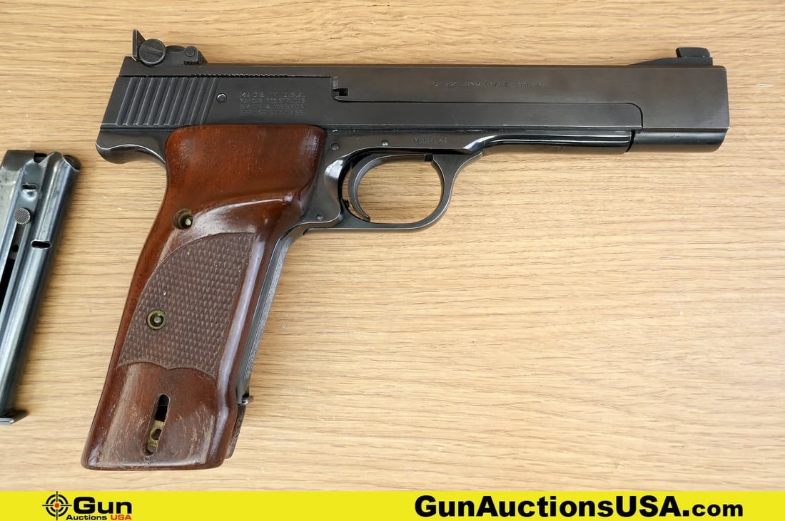 S&W 41 .22 LR Pistol. Good Condition, Normal Handling Marks. 5.5" Barrel. Shiny Bore, Tight Action: S&W 41 .22 LR Pistol. Good Condition, Normal Handling Marks. 5.5" Barrel. Shiny Bore, Tight Action Semi Auto This Precision Marvel Features a Very Light Exceptional SA only Trigger, Fixed Front Sight,