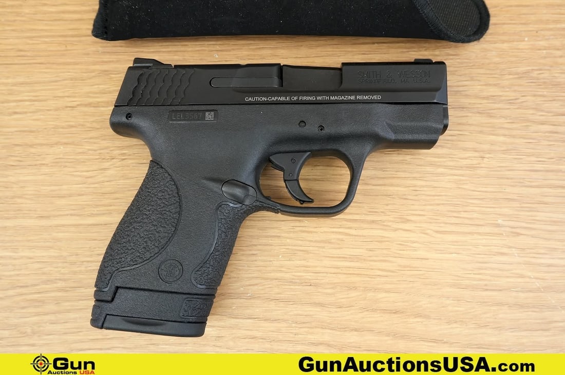 S&W M&P 9 SHIELD 9mm Pistol . Excellent. 3" Barrel. Shiny Bore, Tight Action Semi Auto Features a: S&W M&P 9 SHIELD 9mm Pistol . Excellent. 3" Barrel. Shiny Bore, Tight Action Semi Auto Features a Drift Adjustable White Dot Front and Rear Sights, Stainless Steel Slide and Barrel with Melanite Finis