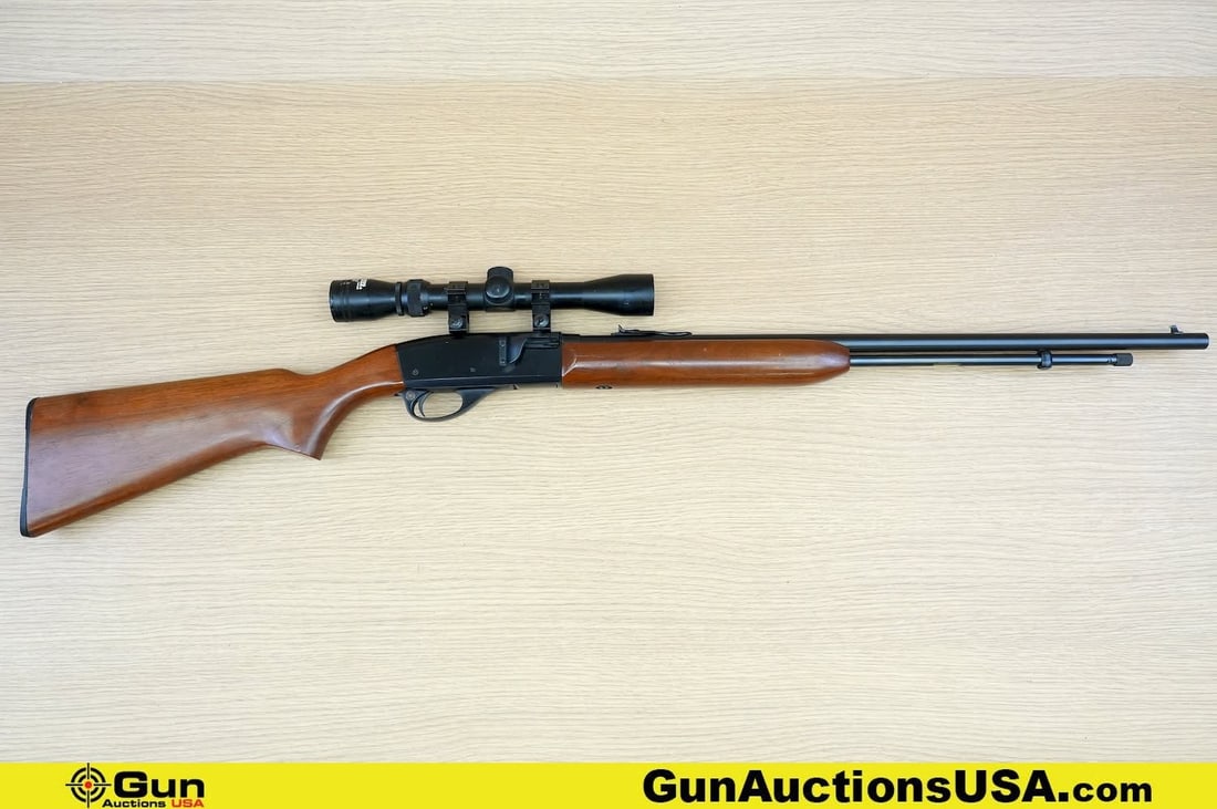 REMINGTON 552 SPEEDMASTER .22 S-L-LR Rifle. Very Good. 23" Barrel. Shiny Bore, Tight Action Semi: REMINGTON 552 SPEEDMASTER .22 S-L-LR Rifle. Very Good. 23" Barrel. Shiny Bore, Tight Action Semi Auto Features a Non Reciprocating Charging Handle, Walnut Stock and Hand Guard, with a Polymer Butt Pla