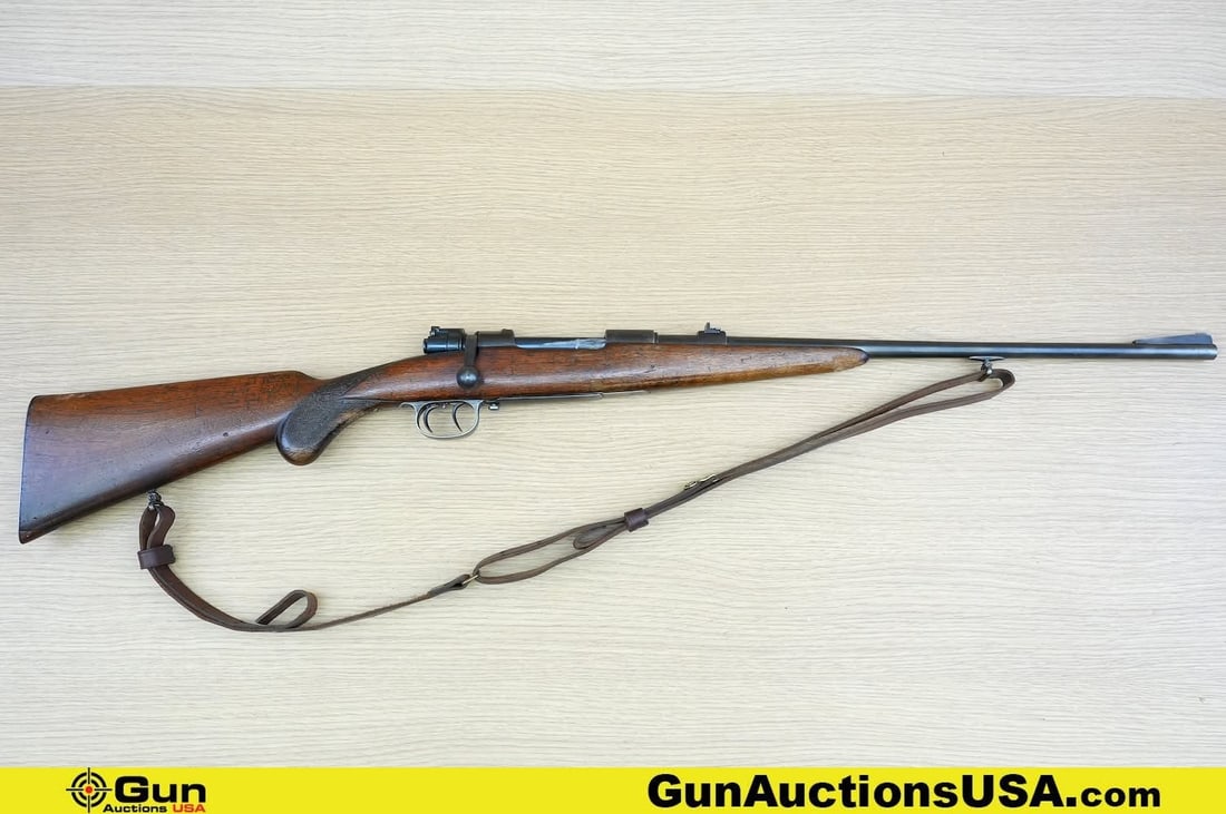 Mauser 8 MM Rifle. Fair Condition. 21" Barrel. Shiny Bore, Tight Action Bolt Action Features: Mauser 8 MM Rifle. Fair Condition. 21" Barrel. Shiny Bore, Tight Action Bolt Action Features MATCHING NUMBERS on Barrel and Receiver, Textured Fixed Front Sight, Flip Up Adjustable Rear Sight, Engrave