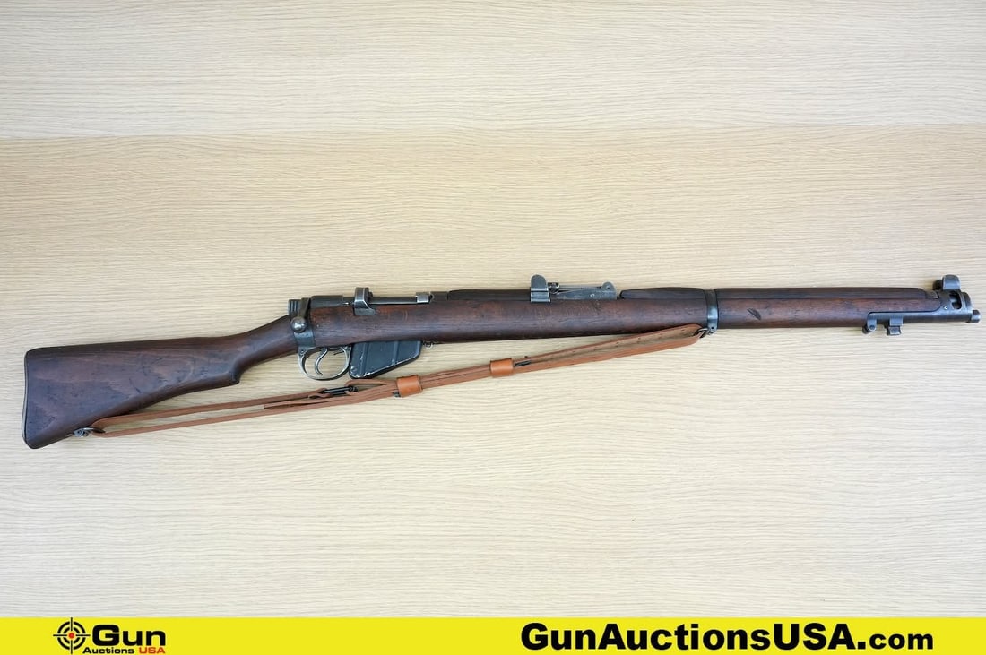 LITHGOW LEE ENFIELD No.1 MK-III 303 BRITISH COLLECTOR'S Rifle. Good Condition, Normal Handling: LITHGOW LEE ENFIELD No.1 MK-III 303 BRITISH COLLECTOR'S Rifle. Good Condition, Normal Handling Marks. 25" Barrel. Shiny Bore, Tight Action Bolt Action Features a CIRLCE PROOF STAMPED Behind Trigger Gu