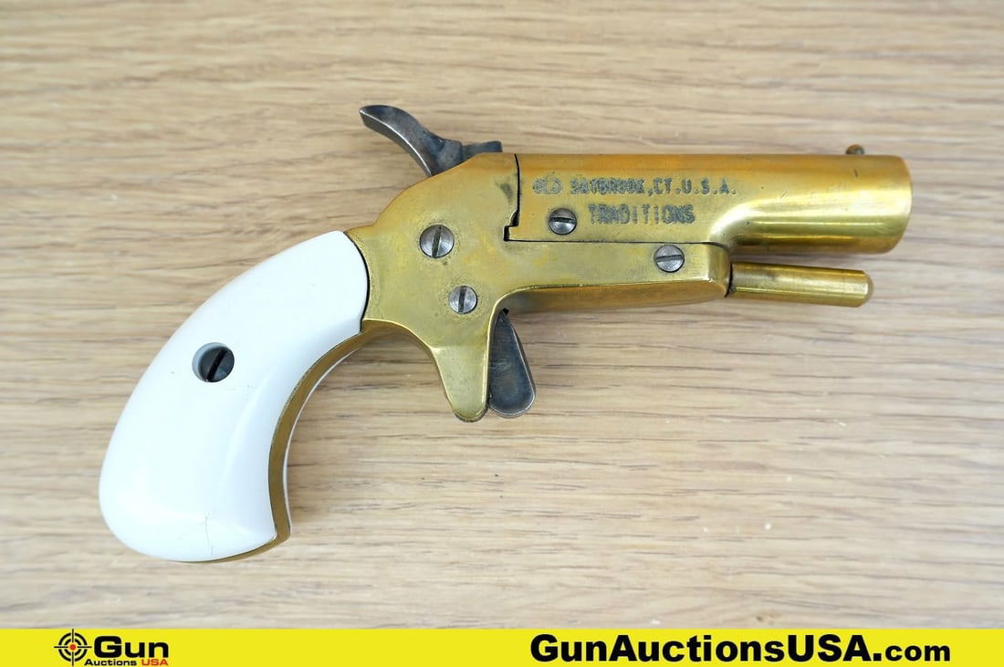 Traditions .31 Caliber Pistol. Good Condition, Normal Handling Marks. 2.25" Barrel. Single Shot: Traditions .31 Caliber Pistol. Good Condition, Normal Handling Marks. 2.25" Barrel. Single Shot Derringer A Cap and Ball Pistol with a Brass Barrel and Receiver, Rotating Break Action, Case Hardened S