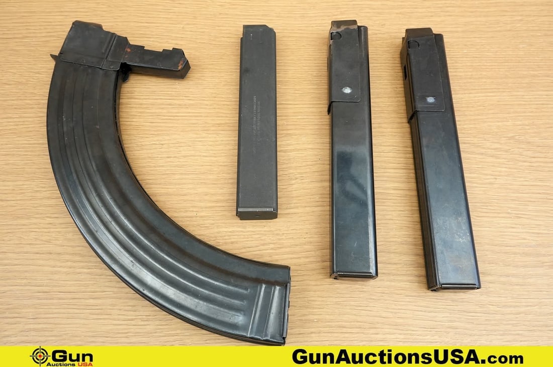 Colt, SPW, Etc. 9MM, .45 ACP, 7.62x39 COLLETOR'S Magazines. Very Good. One Colt SMG 32 Rd 9MM: Colt, SPW, Etc. 9MM, .45 ACP, 7.62x39 COLLETOR'S Magazines. Very Good. One Colt SMG 32 Rd 9MM Magazine with Restricted LE Markings. Two Grease Gun .45 ACP 30 Rd Magazines and One Extended 50 Rd 7.62x3