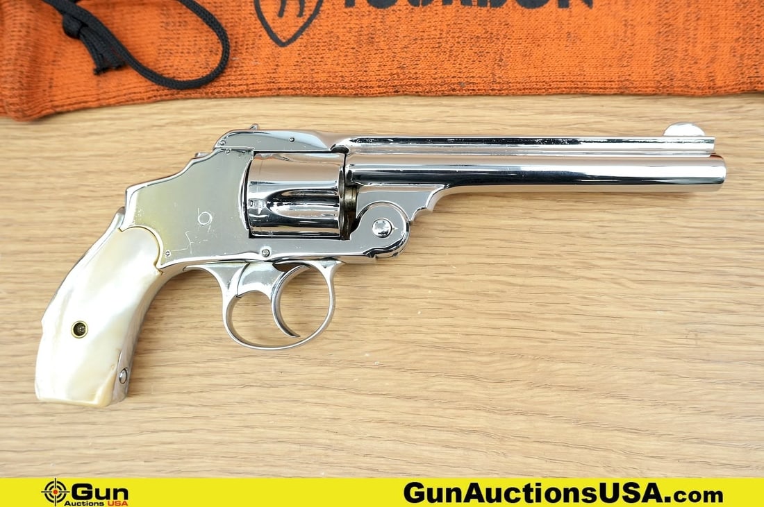 MARLIN 1887 TOP BREAK .32 CAL Revolver. Good Condition, Normal Handling Marks: MARLIN 1887 TOP BREAK .32 CAL Revolver. Good Condition, Normal Handling Marks. 3.25" Barrel. Shiny Bore, Tight Action Features a Steel Frame, Spur Trigger, with Flat Butt. Nickel Plated Finish, Hard R