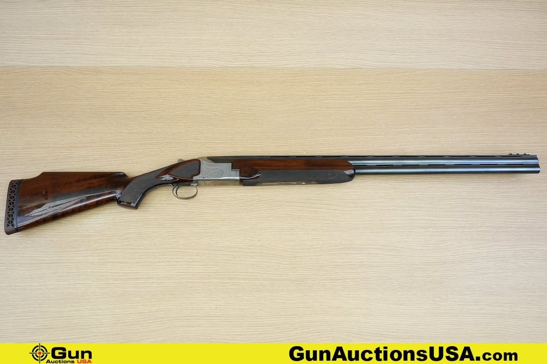 Winchester 101 12 ga. Shotgun. Good Condition, Normal Handling Marks. 30" Barrel. Shiny Bores, Tight: Winchester 101 12 ga. Shotgun. Good Condition, Normal Handling Marks. 30" Barrel. Shiny Bores, Tight Action Break Action Over-Under. Features Finely Crafted Laminated Walnut Stock, Hand Checkered on F