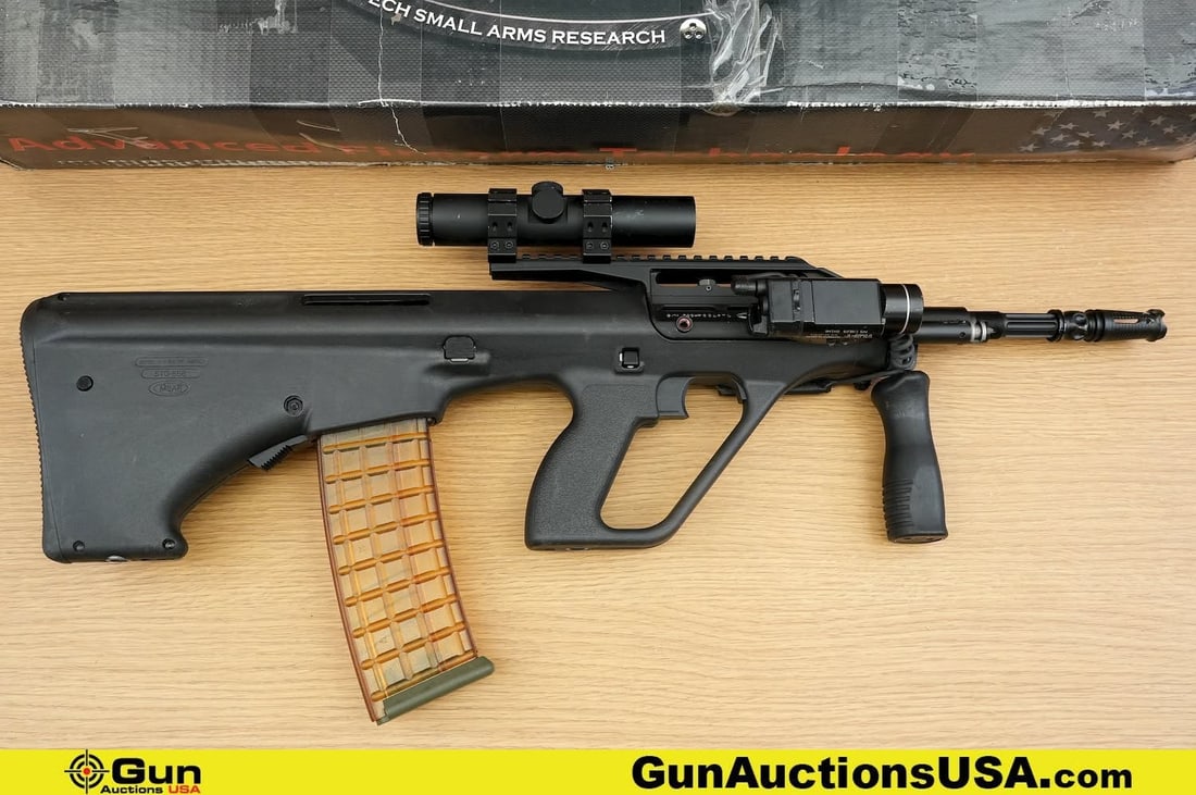 MSAR STG 556 .223 cal. Rifle. Very Good. 16" Barrel. Shiny Bore, Tight Action Semi Auto US Made AUG,: MSAR STG 556 .223 cal. Rifle. Very Good. 16" Barrel. Shiny Bore, Tight Action Semi Auto US Made AUG, Featuring a Quick Change Barrel, Fixed Power Scope, Cross hair Reticle with Capped Adjustments. Ins