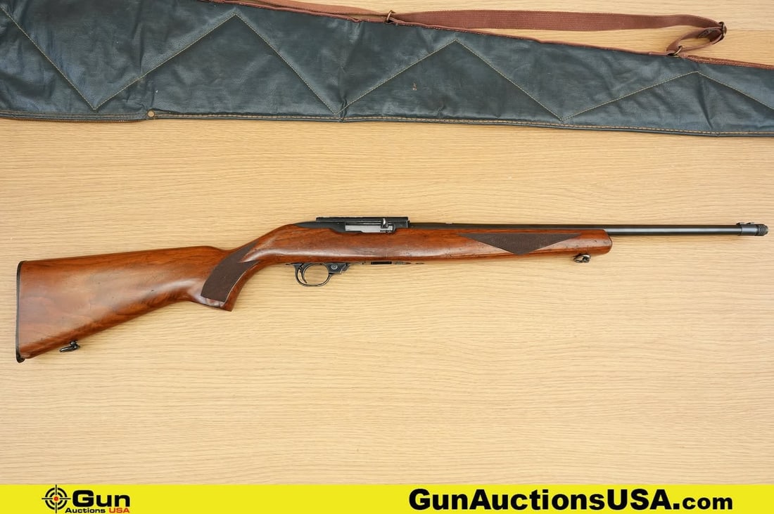 Ruger 10/22 CARBINE .22 LR THREADED BARREL Rifle . Good Condition, Normal Handling Marks. 19": Ruger 10/22 CARBINE .22 LR THREADED BARREL Rifle . Good Condition, Normal Handling Marks. 19" Barrel. Shiny Bore, Tight Action Semi Auto . Features a Walnut Stock with Checkered Hand Grip, Sling Swive